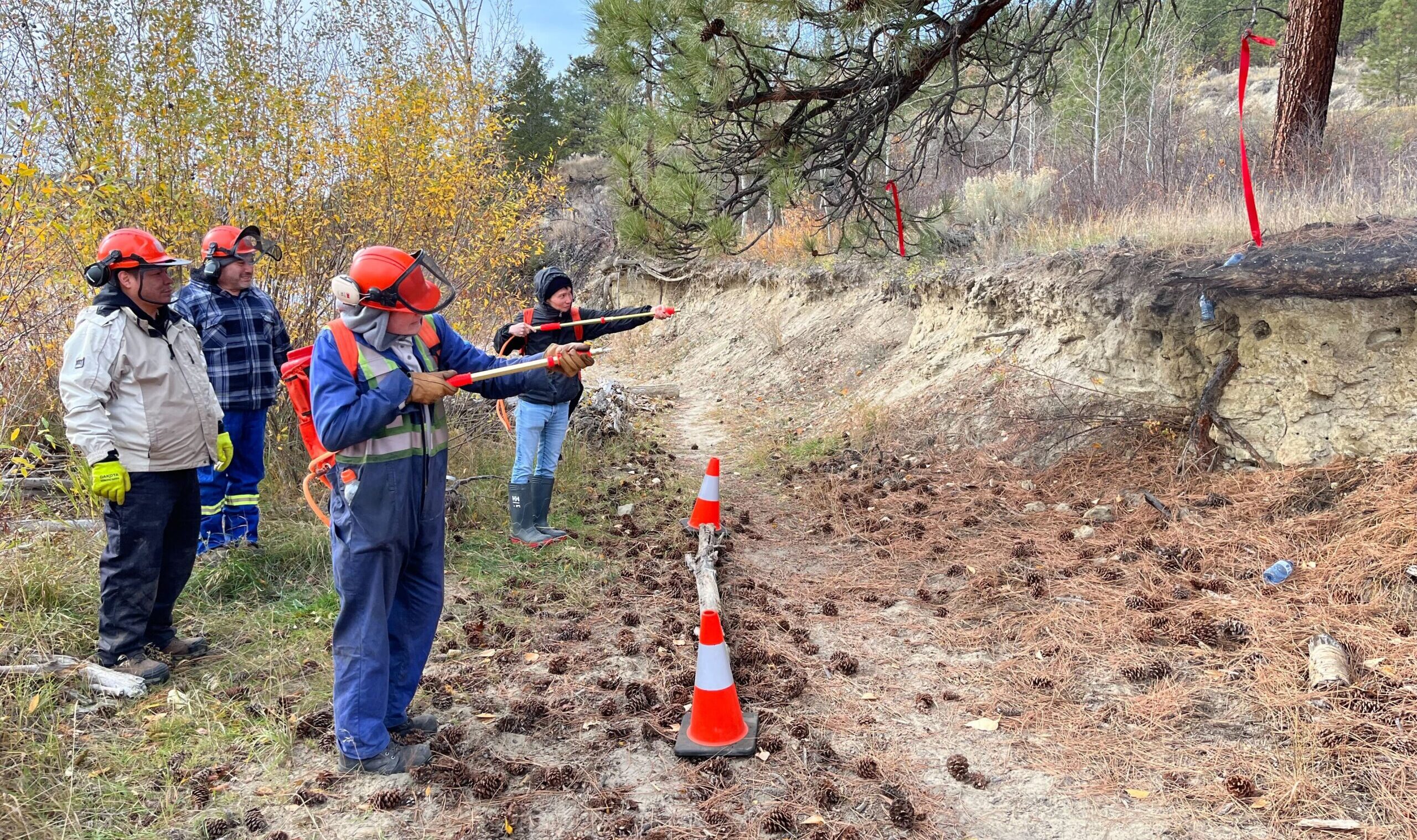 Indigenous firefighters learning Wildfire Training in ?Aqam