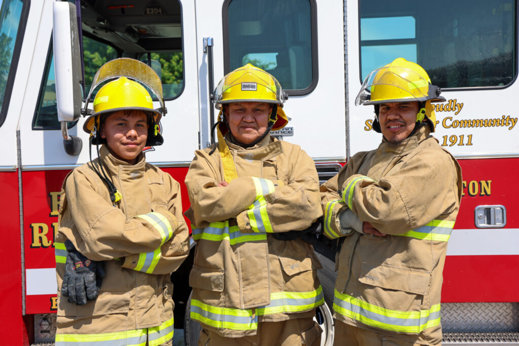 three indigenous firefighters at training